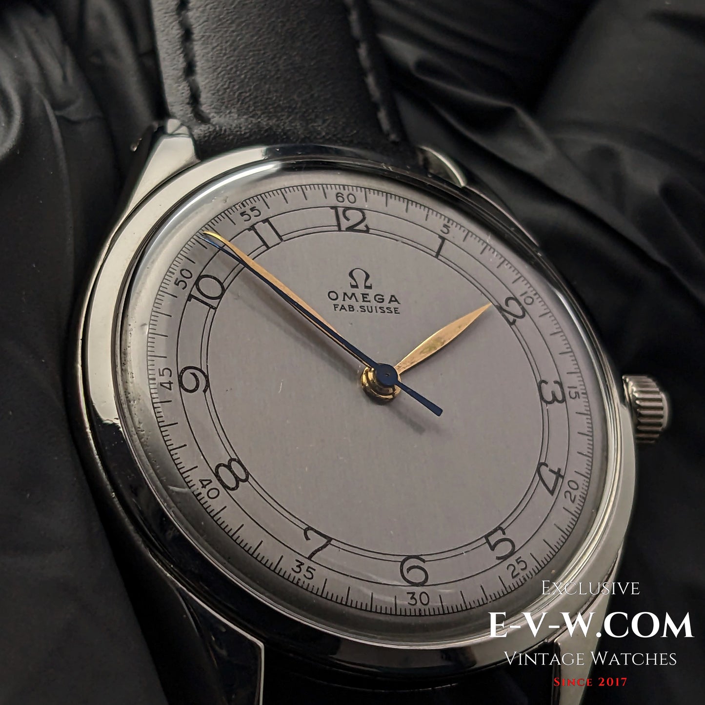 Detailed view of the Omega Sector Jumbo 38mm wristwatch, emphasizing the refined dial design and gold-tone hands.