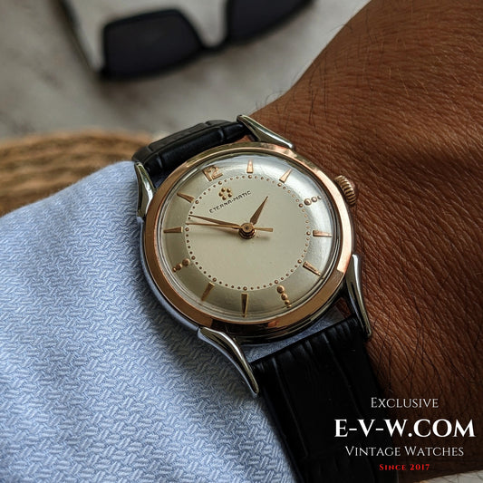 Eterna-Matic, frühes Modell mit fünf Kugeln und Automatikwerk | Zweifarbiges Gehäuse, aufwendig gestaltete Bandanstöße | Kal. 1248T | Baujahr 1950