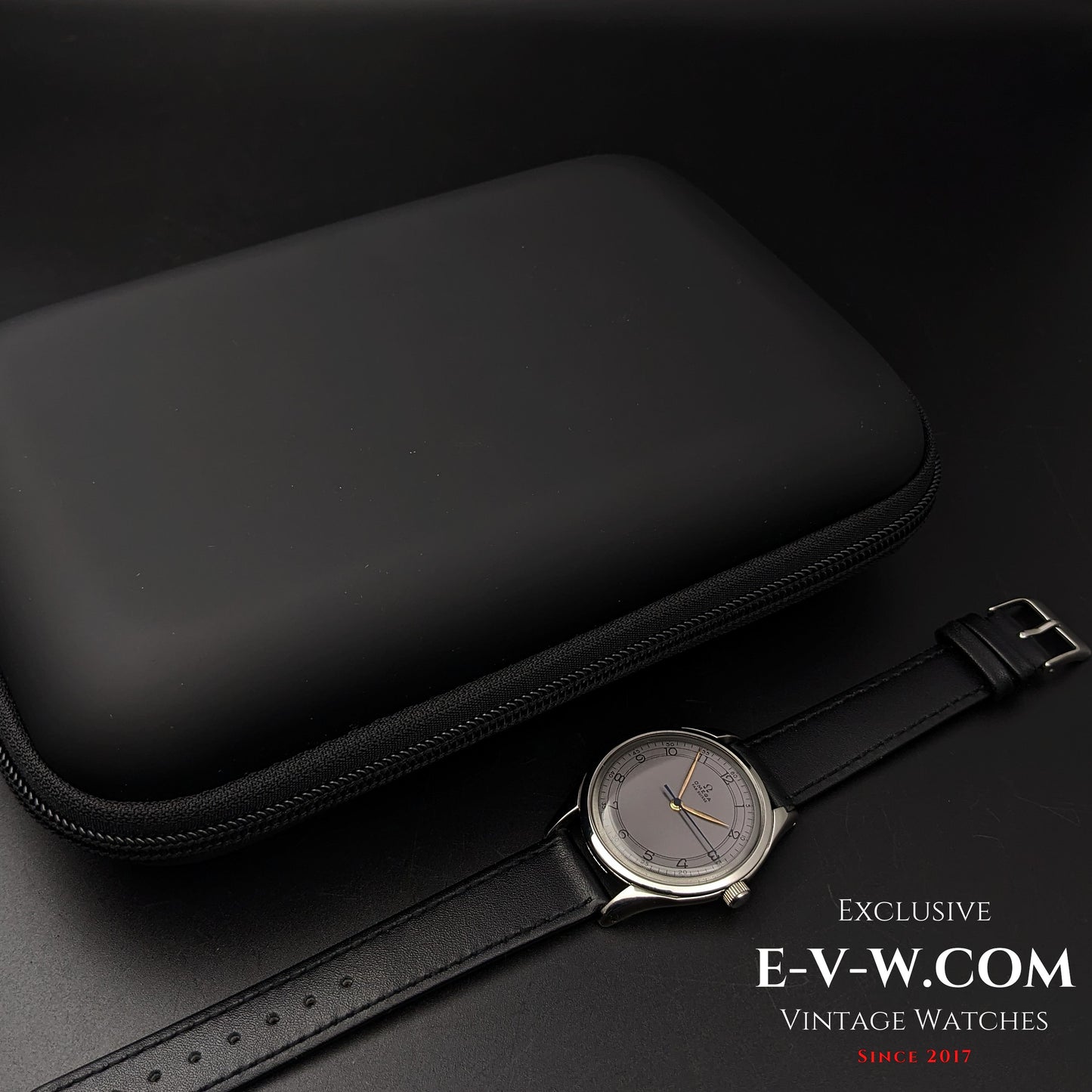 Vintage Omega Sector Jumbo wristwatch displayed next to a black protective case, perfect for storage and safekeeping.