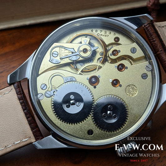 Restored IWC vintage movement in a luxury marriage watch case by EVW