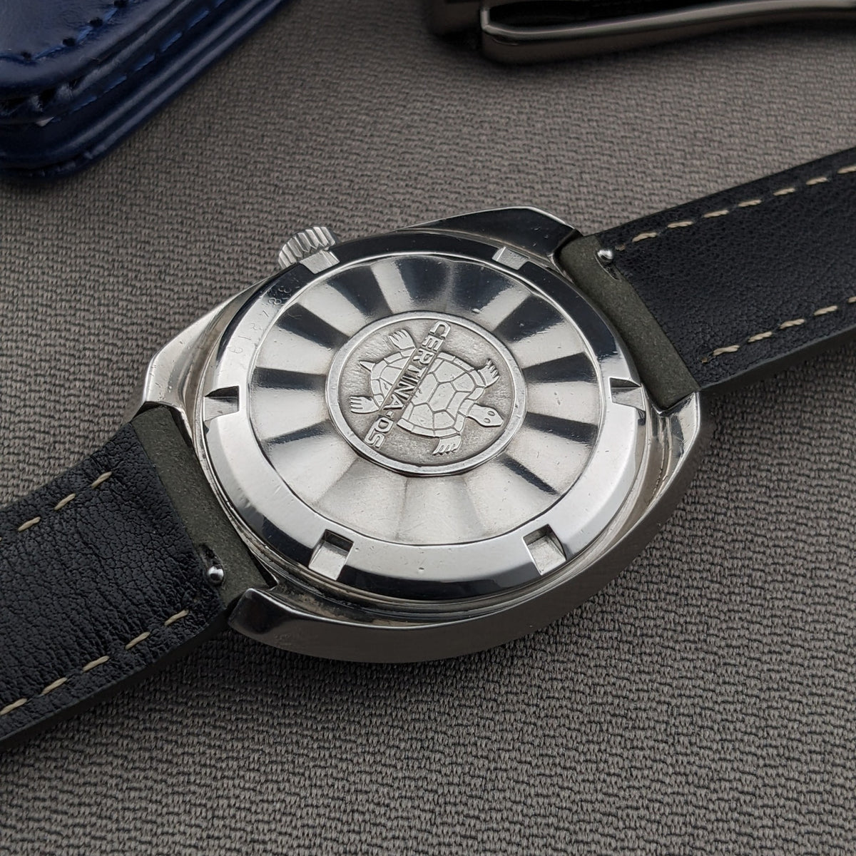 Rear view of the Certina DS-2 Automatic reference 5801 300, showing a polished caseback with a central DS emblem and dark stitched strap.