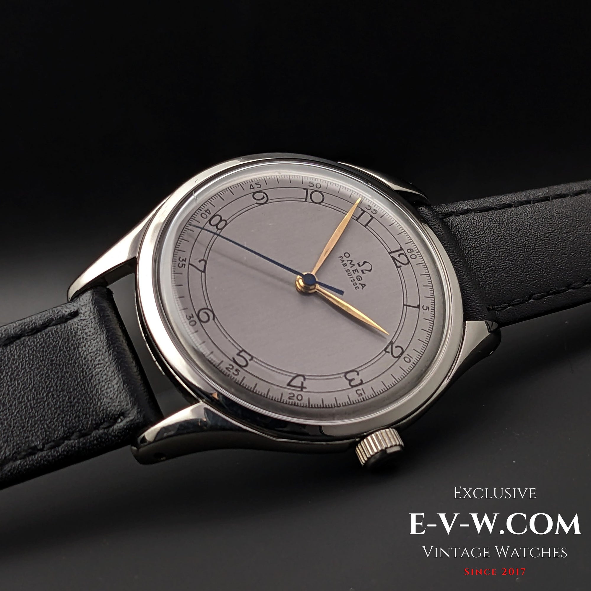 Side profile of the Omega Sector Jumbo 38mm vintage wristwatch, highlighting its polished stainless steel case and domed crystal.