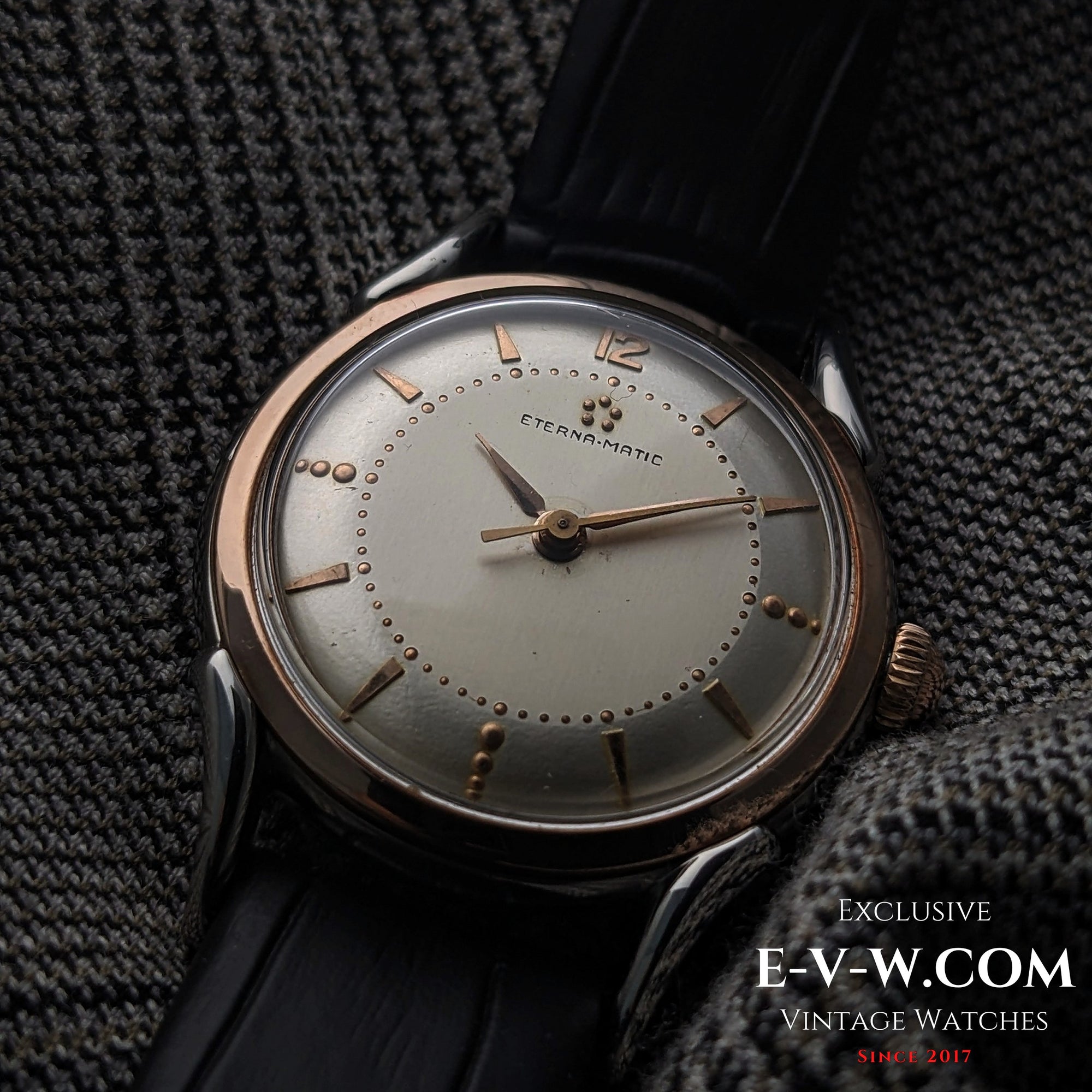 Eterna-Matic, frühes Modell mit fünf Kugeln und Automatikwerk | Zweifarbiges Gehäuse, aufwendig gestaltete Bandanstöße | Kal. 1248T | Baujahr 1950