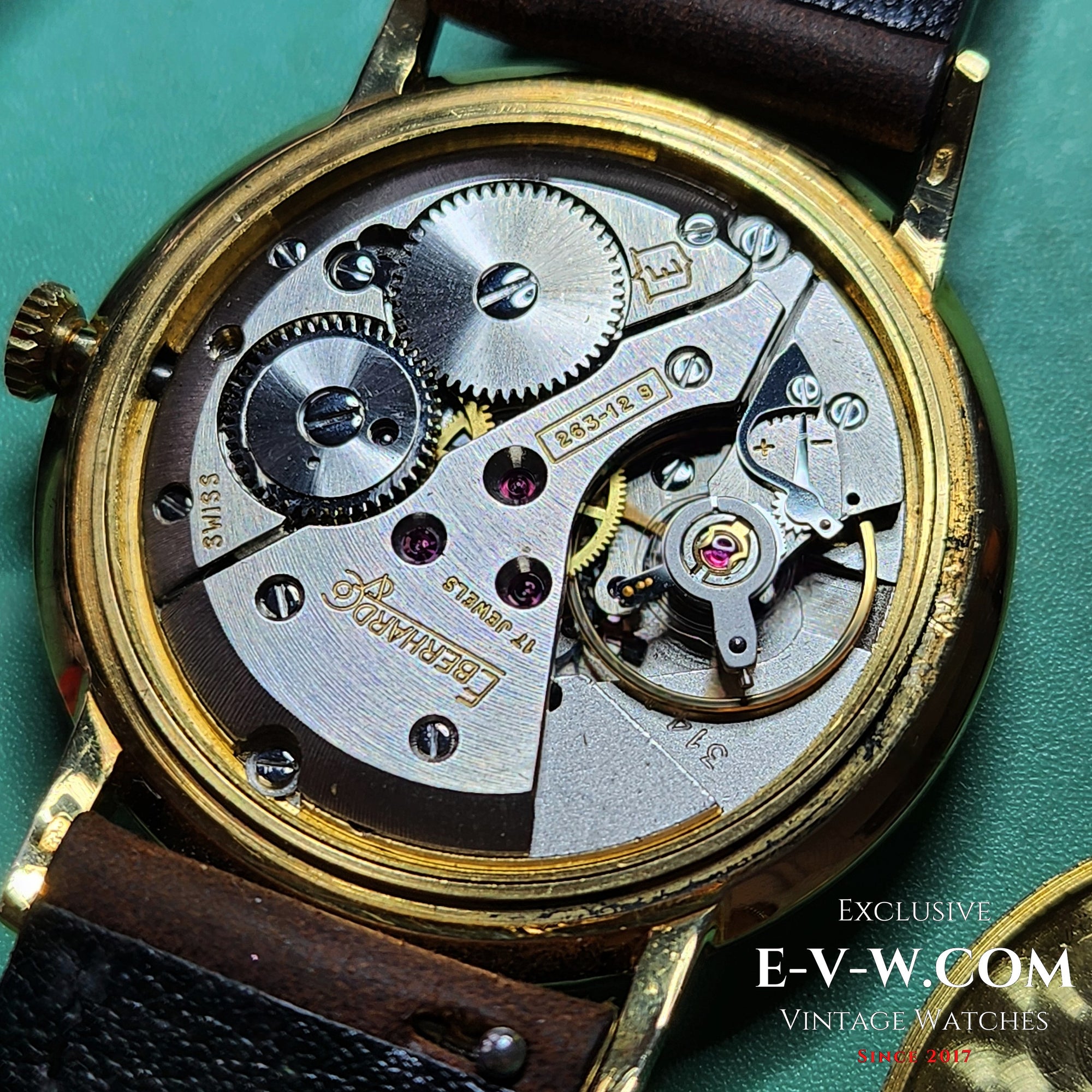 Eberhard &amp; Co. Armbanduhr aus 18-karätigem Gold aus den 1960er Jahren | Seltene Roulette-Datumsanzeige | Kal. 236-129 |