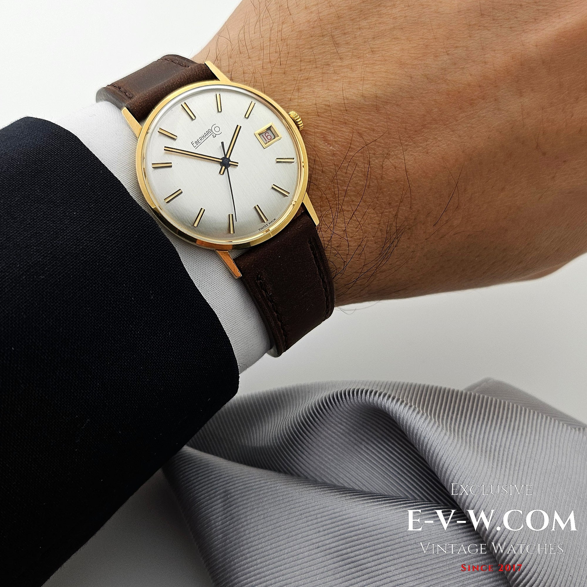 Eberhard &amp; Co. Armbanduhr aus 18-karätigem Gold aus den 1960er Jahren | Seltene Roulette-Datumsanzeige | Kal. 236-129 |