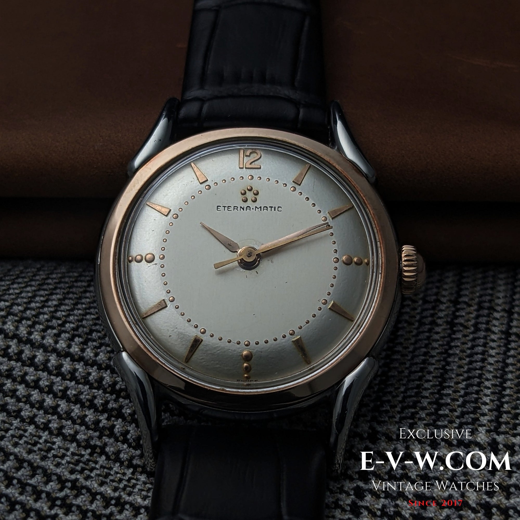 Eterna-Matic, frühes Modell mit fünf Kugeln und Automatikwerk | Zweifarbiges Gehäuse, aufwendig gestaltete Bandanstöße | Kal. 1248T | Baujahr 1950