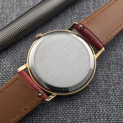 64 Years Old Omega Classic / Ref. 121.002-62 / Cal. 269 / Red Dial / Vintage Watch from 1962 / Serviced vintage watch