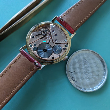 64 Years Old Omega Classic / Ref. 121.002-62 / Cal. 269 / Red Dial / Vintage Watch from 1962 / Serviced vintage watch