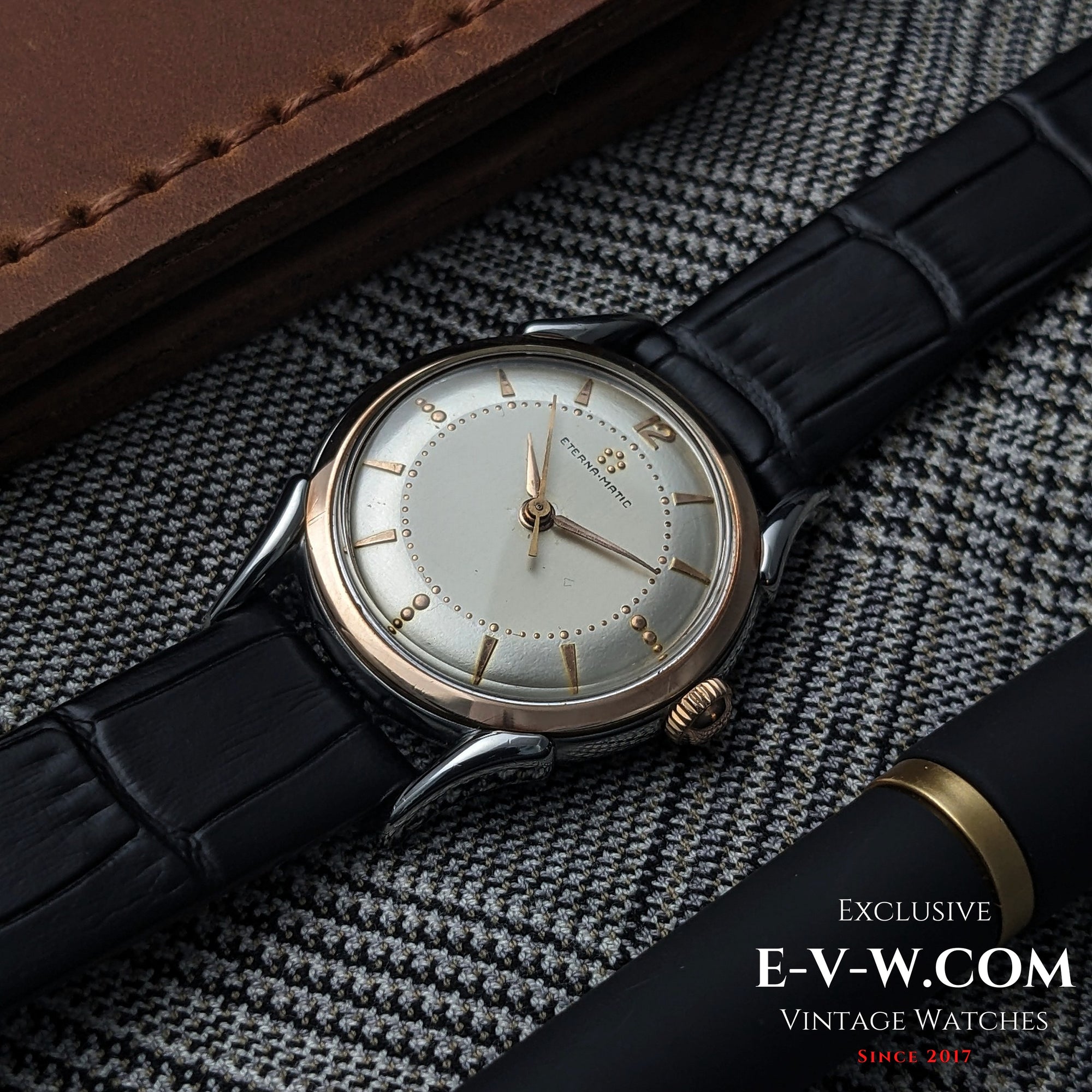 Eterna-Matic, frühes Modell mit fünf Kugeln und Automatikwerk | Zweifarbiges Gehäuse, aufwendig gestaltete Bandanstöße | Kal. 1248T | Baujahr 1950