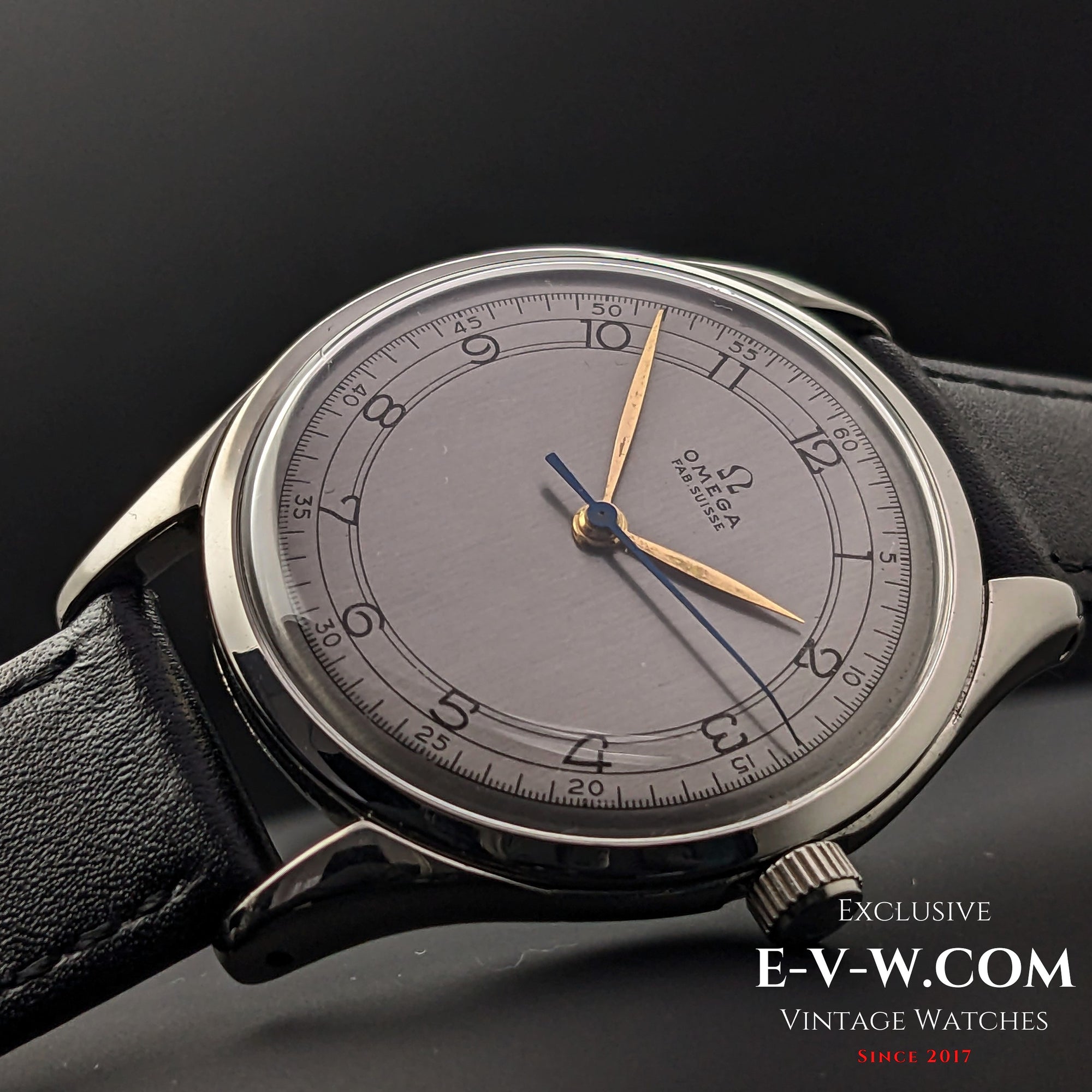 Close-up of the vintage Omega Sector Jumbo 38mm wristwatch, showcasing its elegant silver dial, gold-tone hands, and precise minute track.