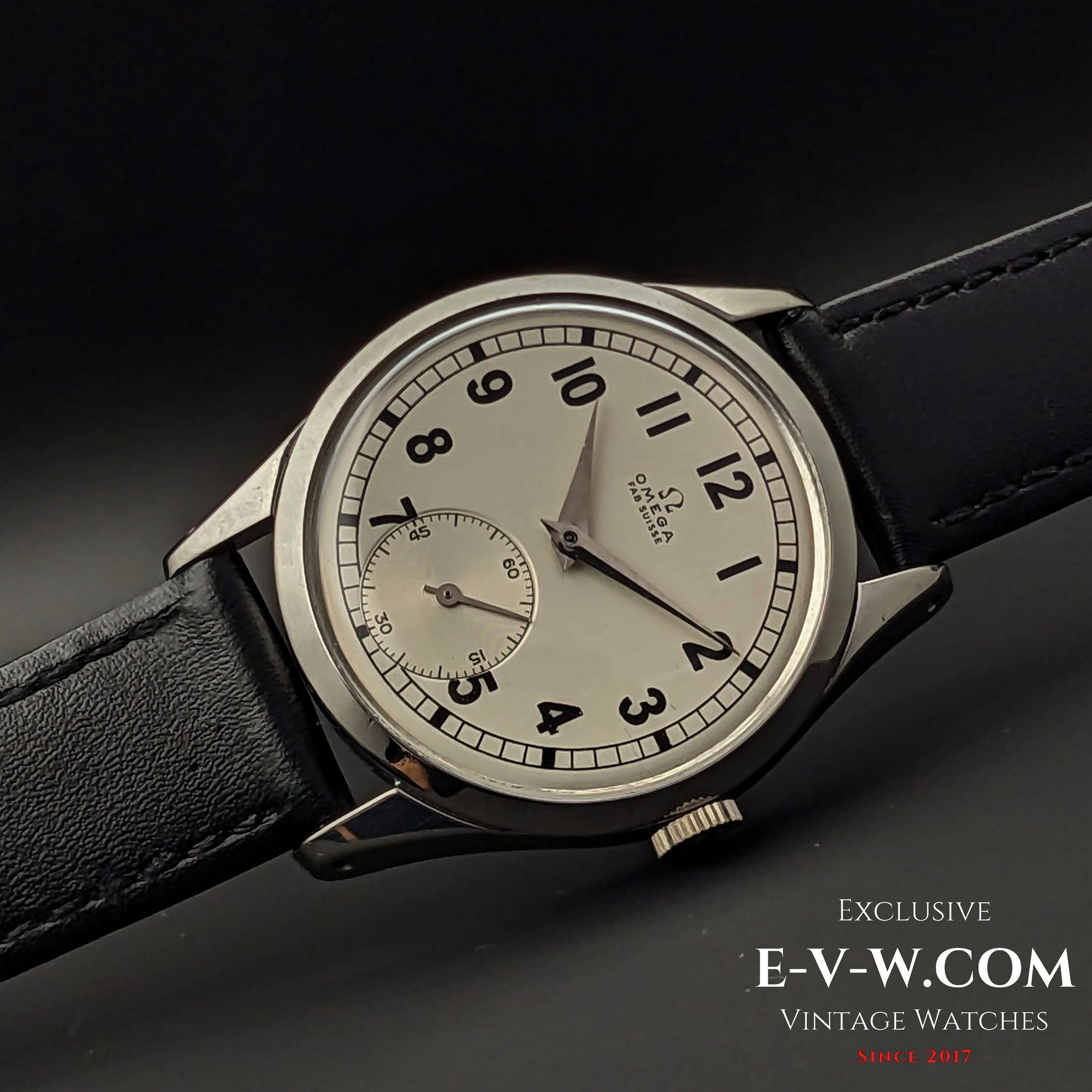 Side view of the Omega FAB SUISSE Ref. 2750-6 vintage wristwatch, showcasing its polished stainless steel case and elegant design.