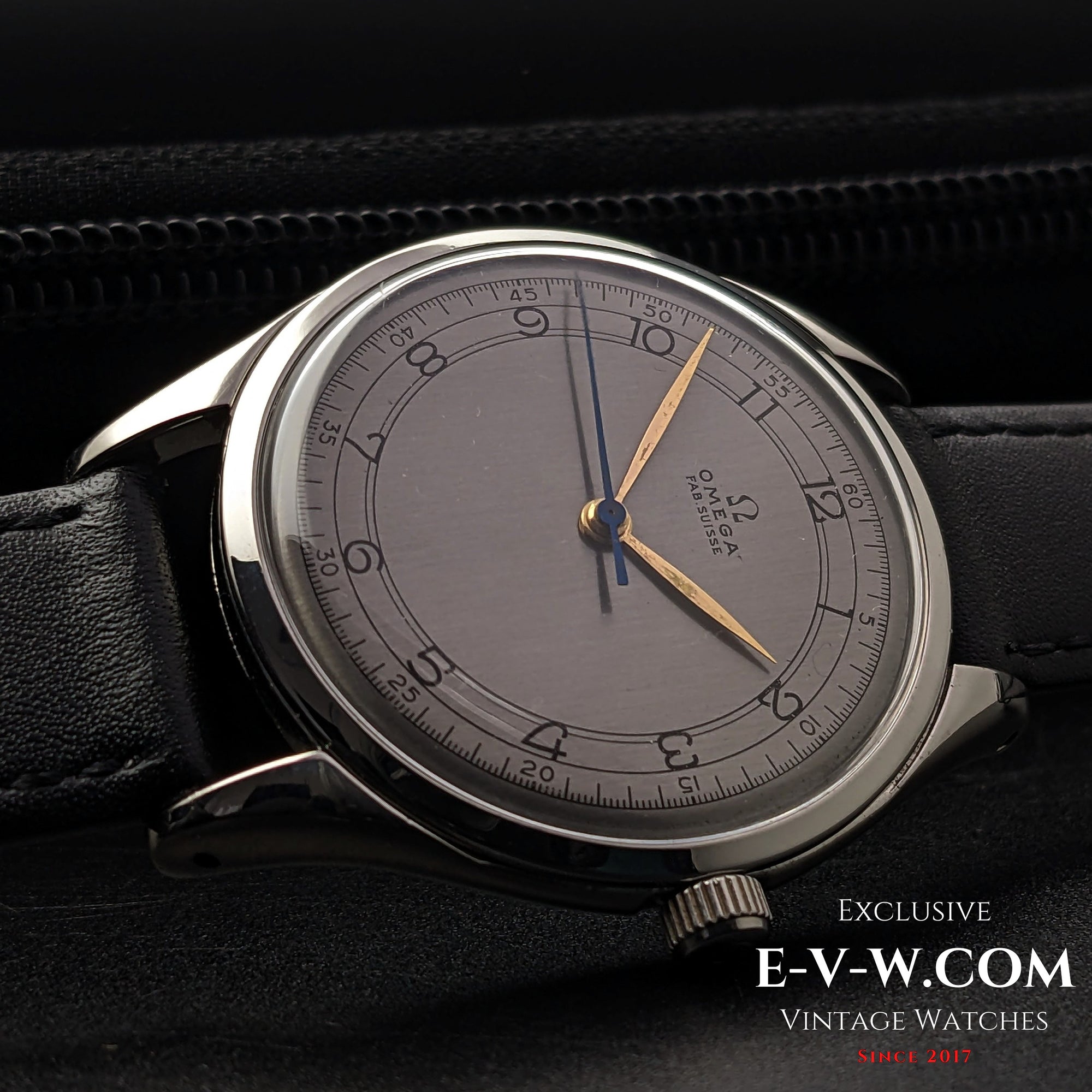 Close-up of the Omega Sector Jumbo 38mm wristwatch, emphasizing its elegant silver dial and precise detailing.