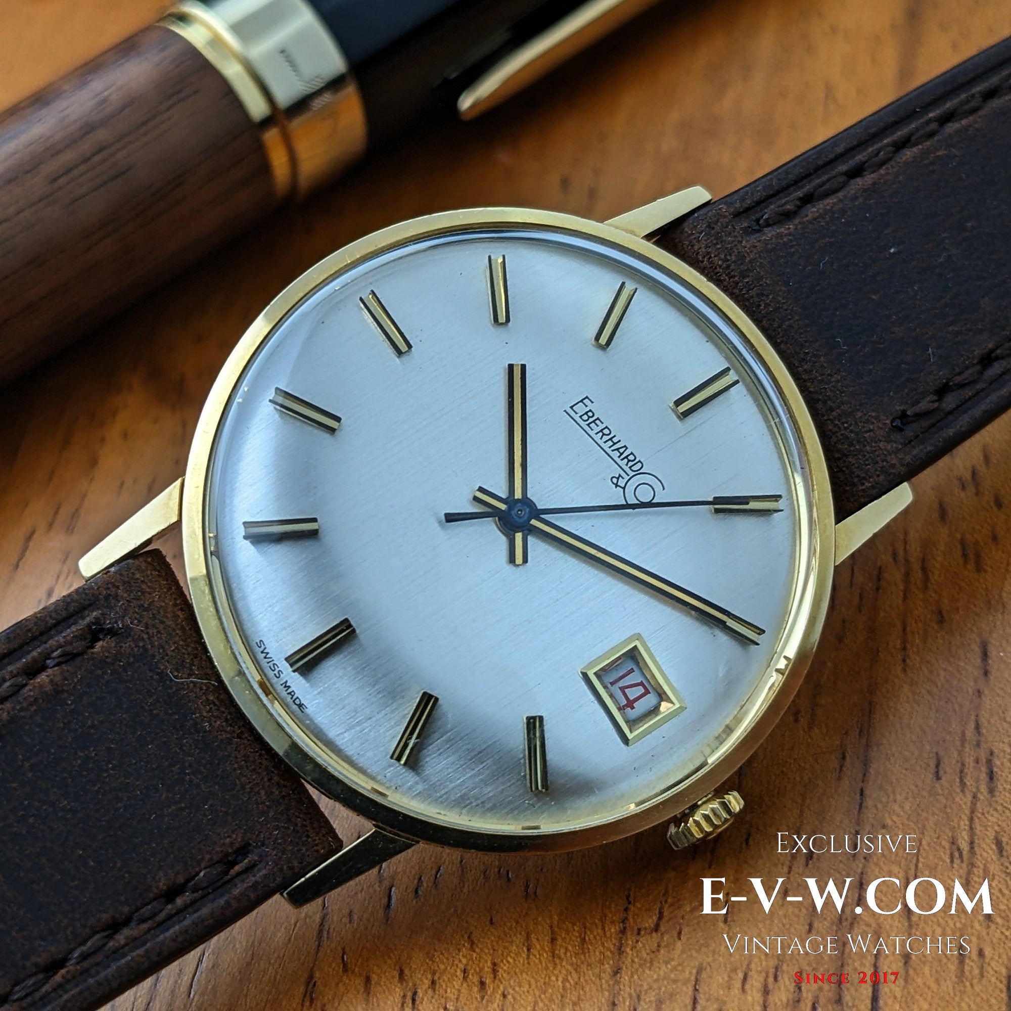 Eberhard &amp; Co. Armbanduhr aus 18-karätigem Gold aus den 1960er Jahren | Seltene Roulette-Datumsanzeige | Kal. 236-129 |