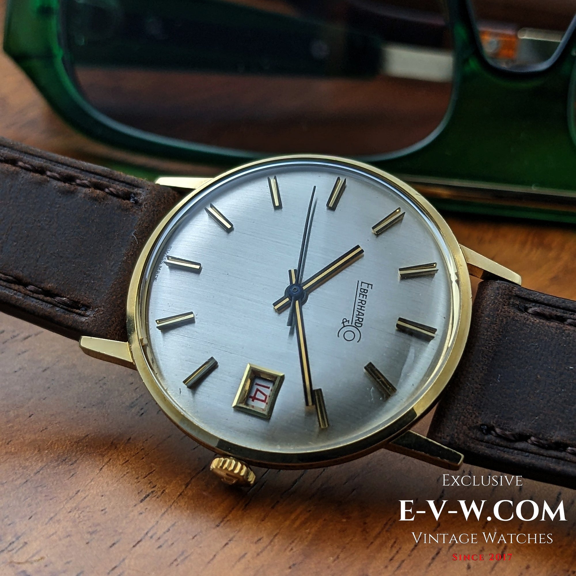 Eberhard &amp; Co. Armbanduhr aus 18-karätigem Gold aus den 1960er Jahren | Seltene Roulette-Datumsanzeige | Kal. 236-129 |