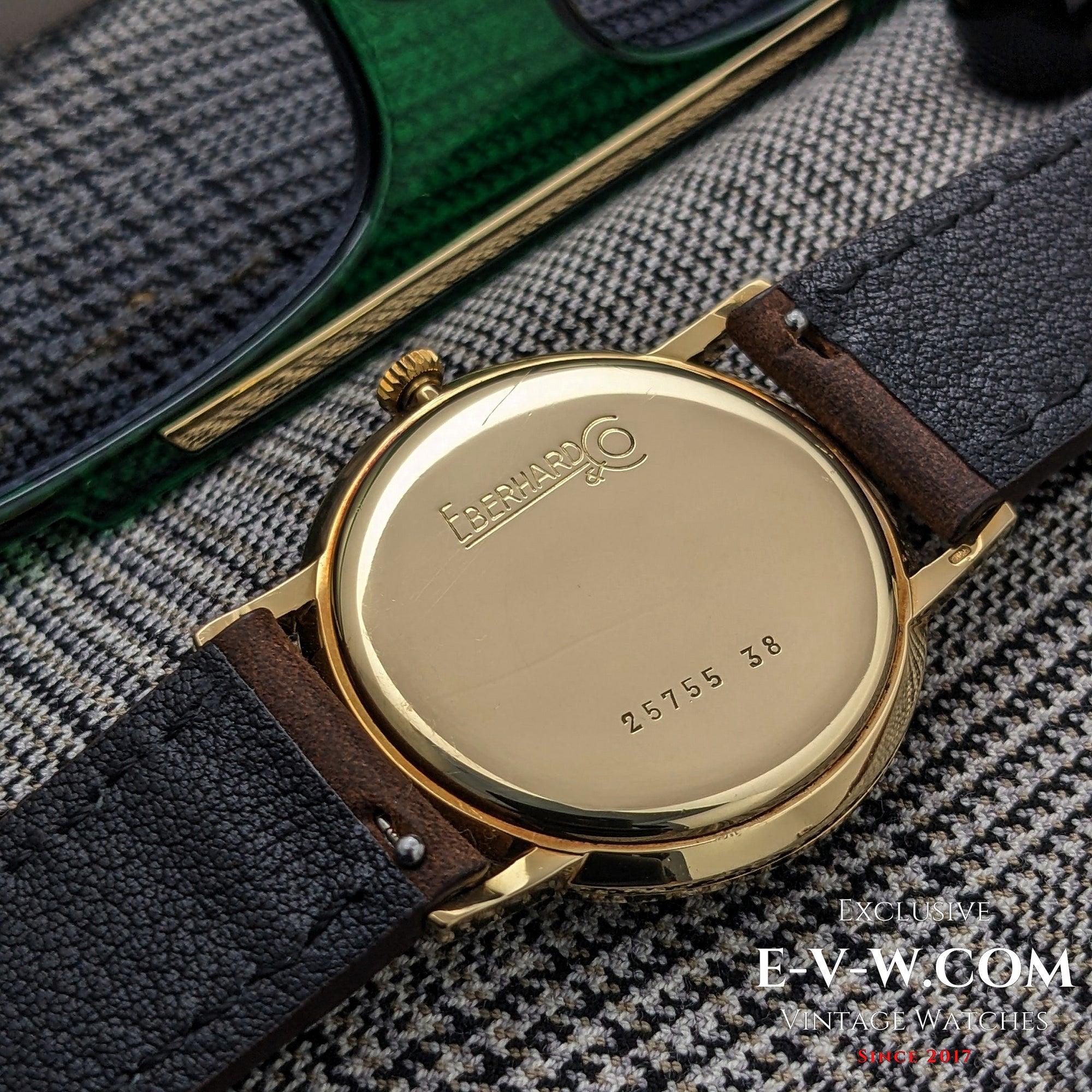 Eberhard &amp; Co. Armbanduhr aus 18-karätigem Gold aus den 1960er Jahren | Seltene Roulette-Datumsanzeige | Kal. 236-129 |