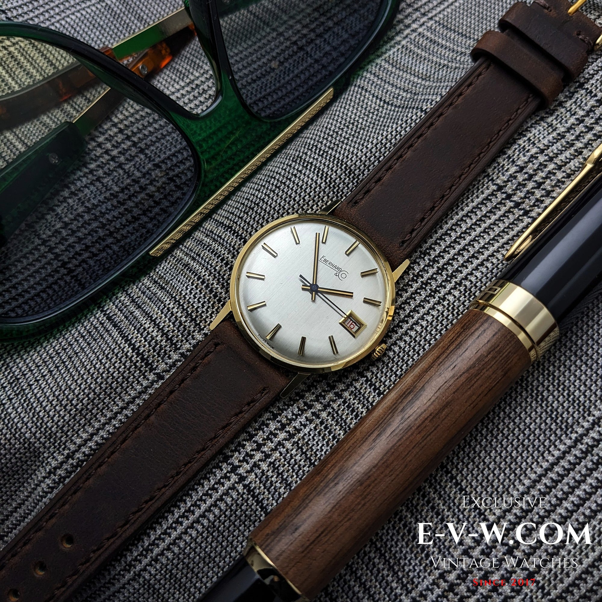 Eberhard &amp; Co. Armbanduhr aus 18-karätigem Gold aus den 1960er Jahren | Seltene Roulette-Datumsanzeige | Kal. 236-129 |