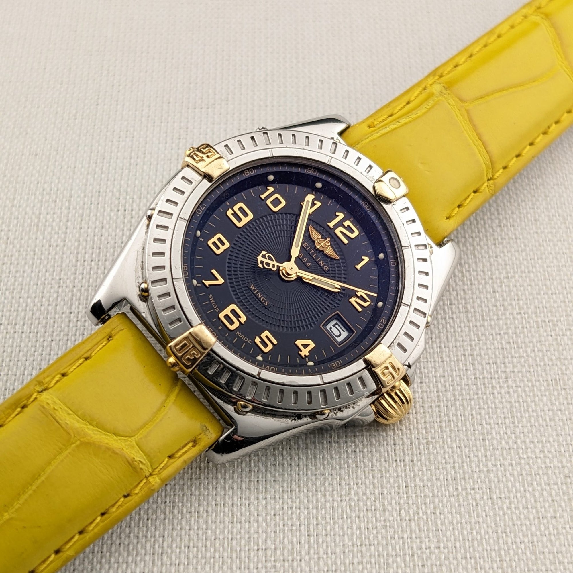 Breitling Wings Stainless Steel Gold Dark Blue Dial Quartz Ladies Watch B67050 vintage watch