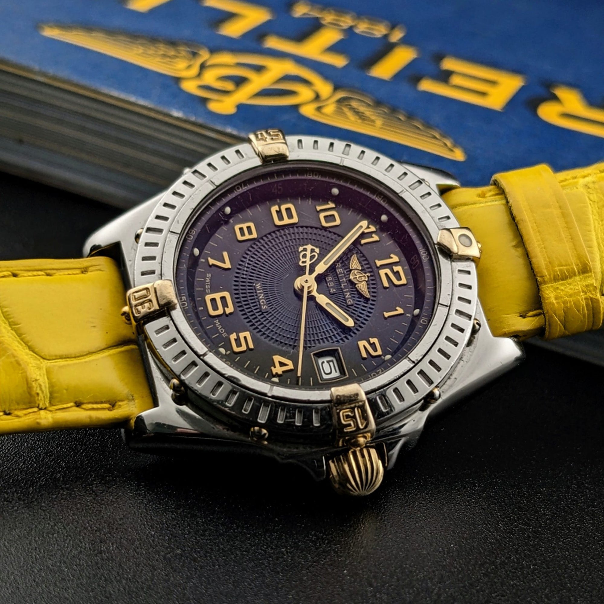 Breitling Wings Stainless Steel Gold Dark Blue Dial Quartz Ladies Watch B67050 vintage watch