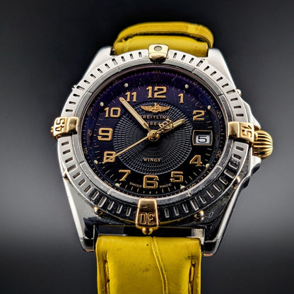 Breitling Wings Stainless Steel Gold Dark Blue Dial Quartz Ladies Watch B67050 vintage watch