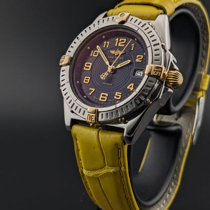 Breitling Wings Stainless Steel Gold Dark Blue Dial Quartz Ladies Watch B67050 vintage watch